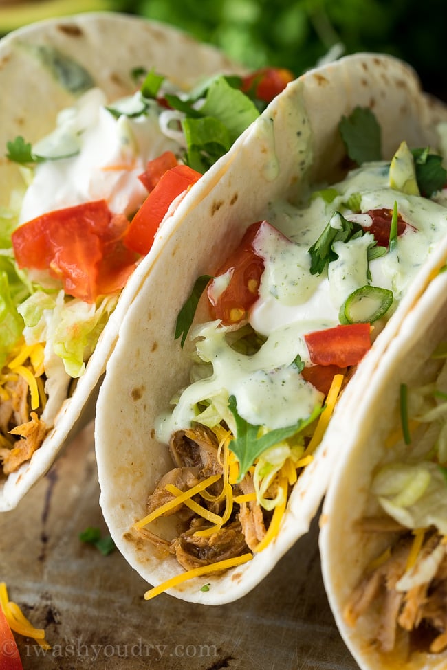 These Slow Cooker Sweet Pulled Pork Tacos are my family's favorite easy weeknight dinner!