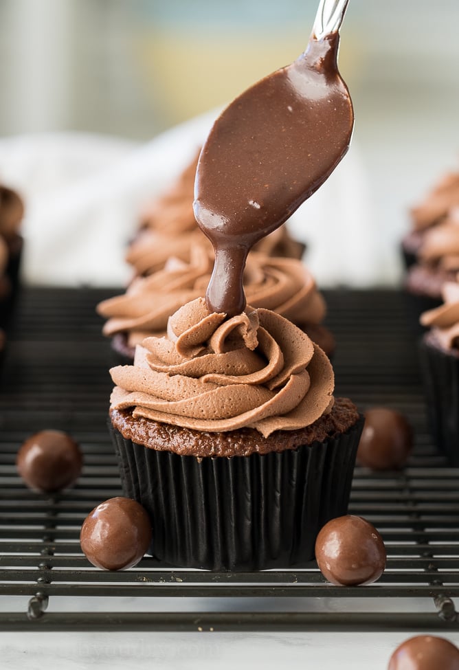 Drizzle a spoonful of chocolate ganache over the tops of each cupcake for a pretty presentation.
