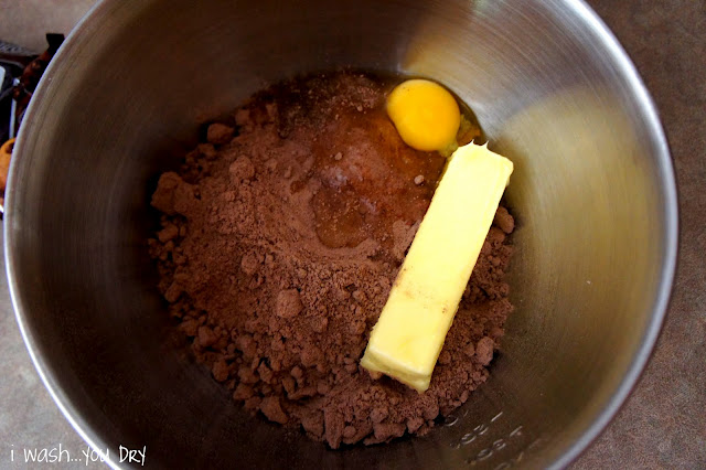 Ingredients needed to make Gooey Samoa Cake Bars in a bowl ready to be mixed
