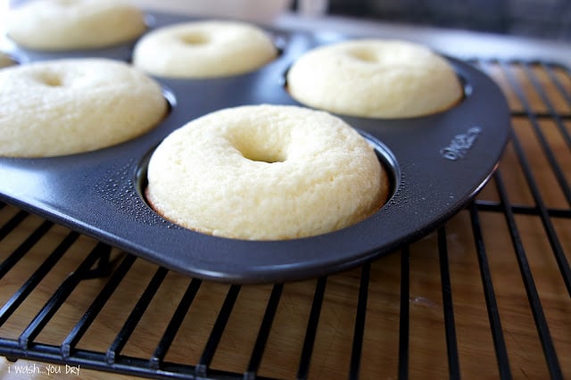 Baked donuts in a donut baking pan