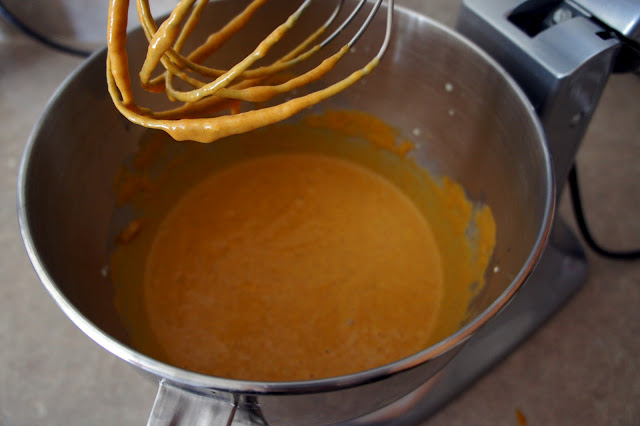 Pumpkin pie batter in a mixing bowl