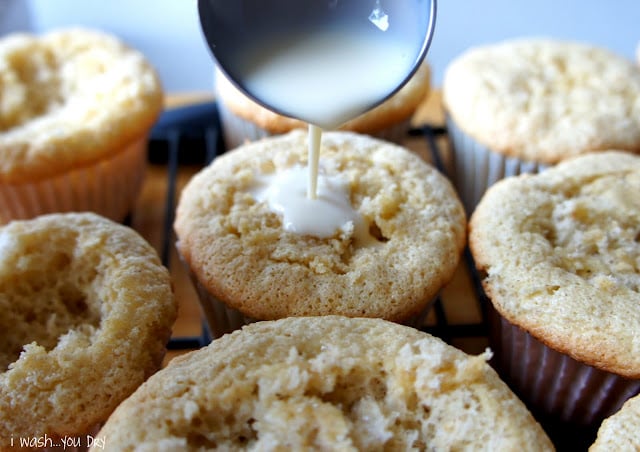 Score the tops of the cupcakes to allow the milks to seep in and soak up.
