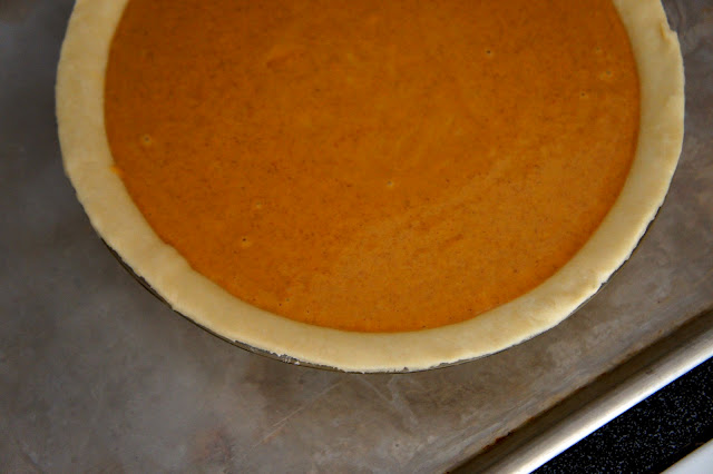 A close up of a pie on a baking pan