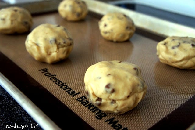 Balls of cookie dough on a baking sheet