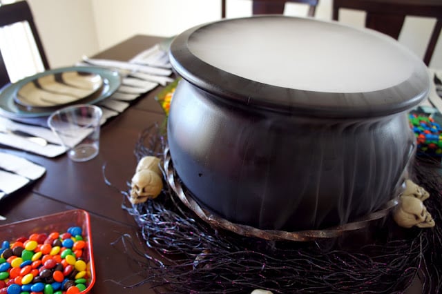 Create a fun Halloween table setting with dry ice and rootbeer!