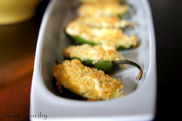 A close up of a display of Cheesy Baked Jalapeño Poppers on a plate