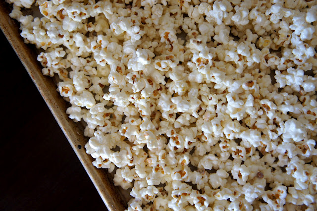 A close up of popcorn in a baking pan
