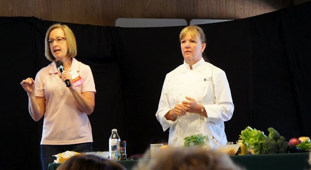 A presenter talking next to a chef at Camp Blogaway 2012