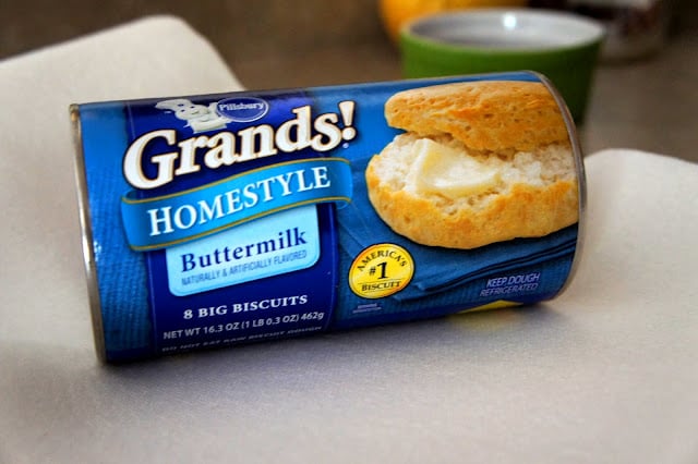 A close up of a tube of refrigerator biscuits labeled, \"Grands! Homestyle Buttermilk\" 