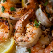 A close up of food, with Lemon and Shrimp