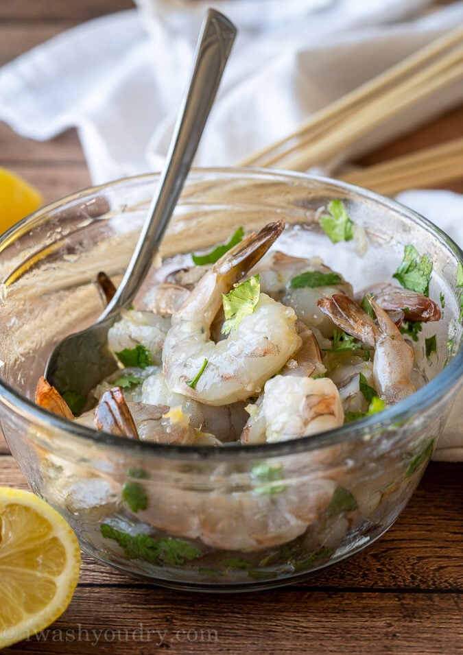 Marinate the shrimp in a mixture of lemon, garlic and cilantro!