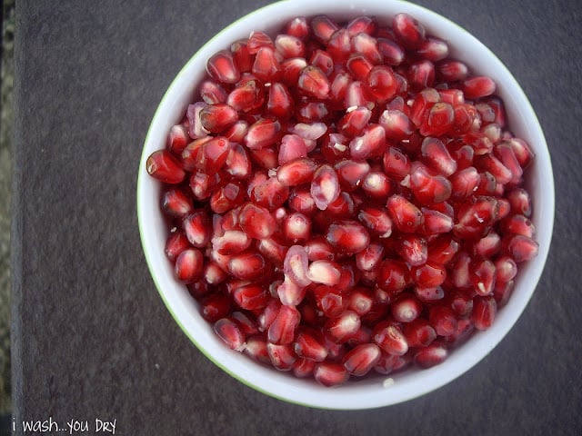 A bowl of pomegranate seeds.