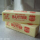 Two stick of butter stacked on top of each other.