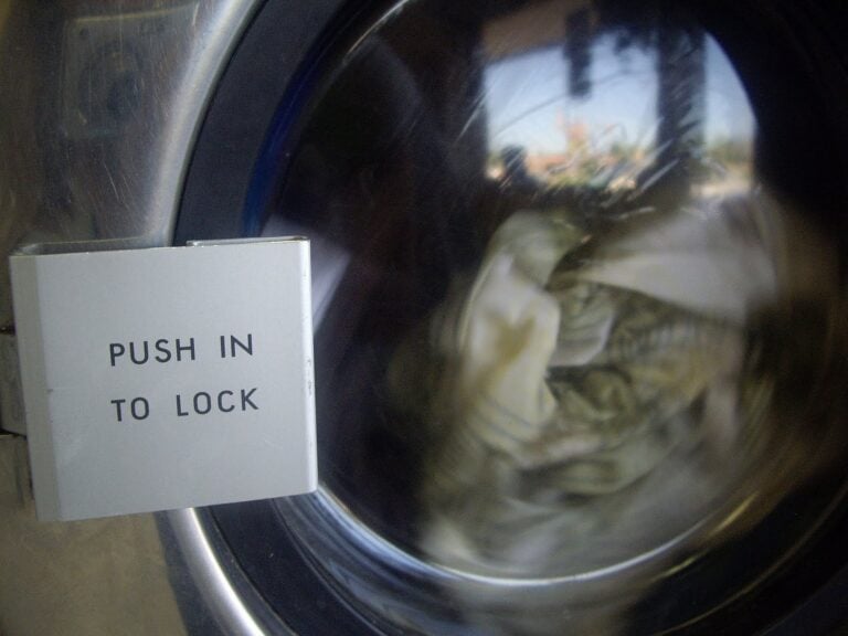 A close up of laundry washing in a washing machine. 