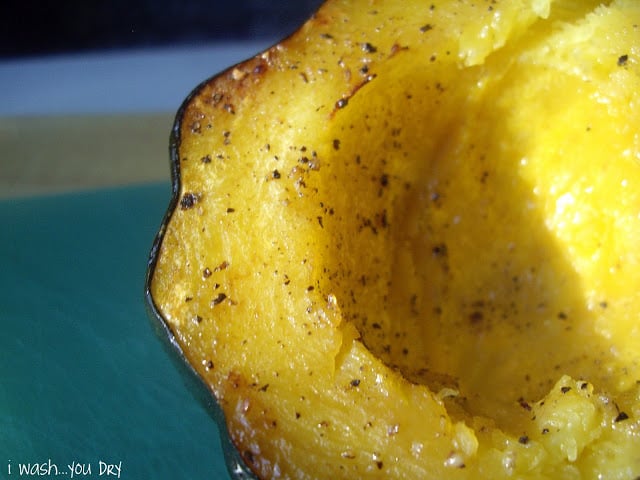 A close up of baked squash with season on it. 