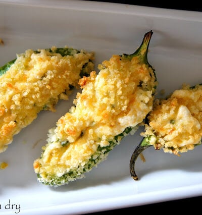 Close up view of Cheesy Baked Jalapeño Poppers displayed on a plate