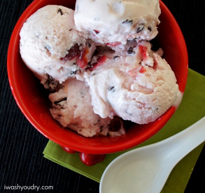 A close up look into a bowl with scoops of frozen yogurts