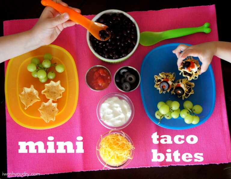 Mini Taco Bites and fixings showcased on a table with little hands making them