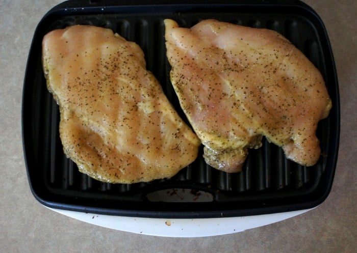 Raw chicken on a grill