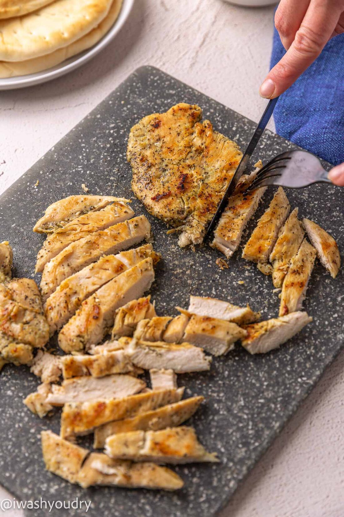 cut chicken breast into strips after letting rest for 5 minutes.