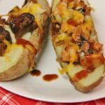 Two halves of a Loaded BBQ Potato Skins