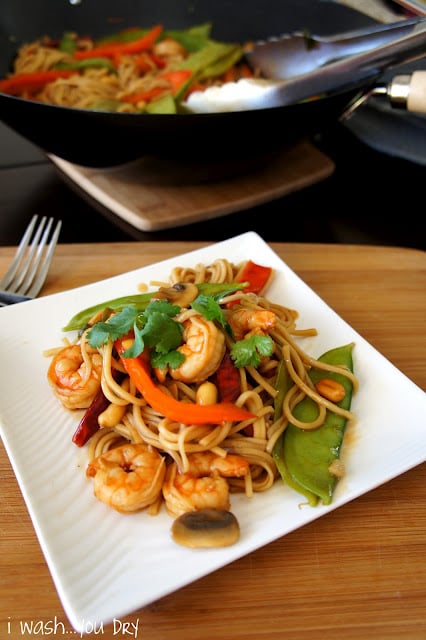 Kung Pao Shrimp Lo Mein displayed on a square plate