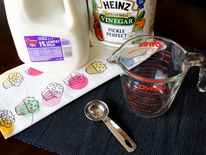 A display of ingredients needed to make buttermilk substitute using milk and vinegar