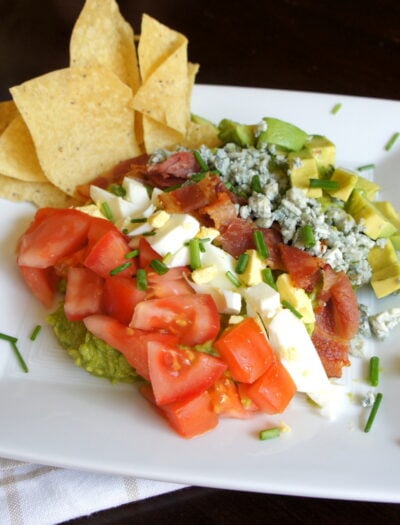A plate showcasing Cobbocado Guacamole with a side of chips