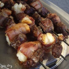 Cooked meat on skewers.