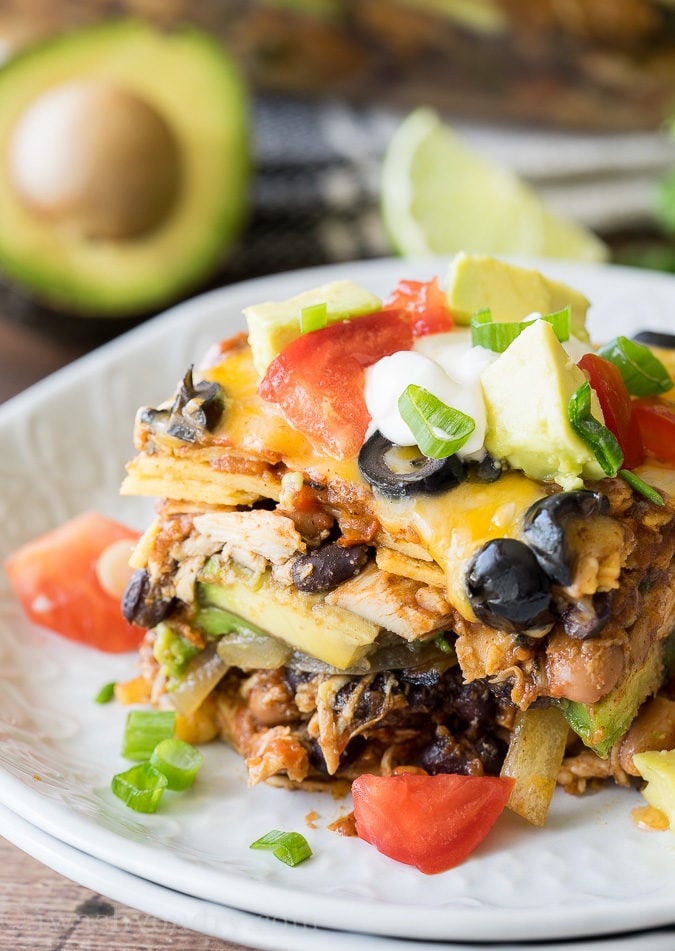 This super EASY Chicken Enchilada Casserole Recipe is a long time family favorite! It combines great flavors into a no-fuss dinner!