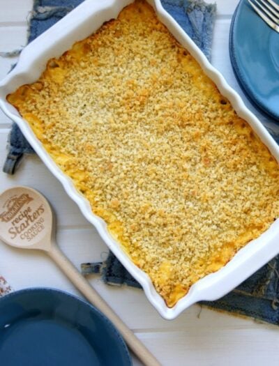 A pan of Cheesy Zucchini and Potato Casserole displayed on a table