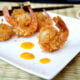 A close up of Curried Coconut Fired Shrimp on a plate