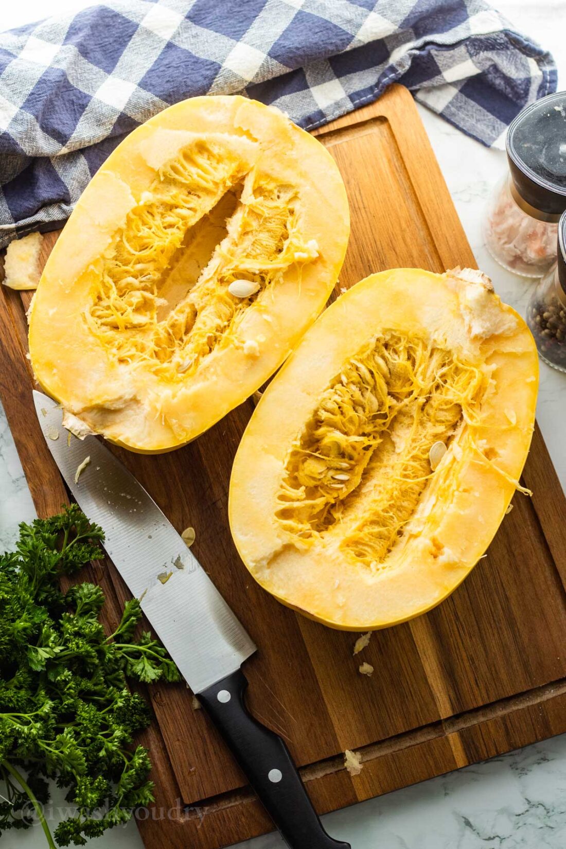 Cut squash in half, with seeds and membranes.