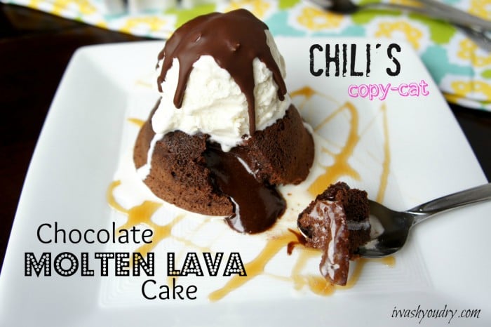 A piece of chocolate lava cake with a scoop of vanilla ice-cream topped with chocolate sauce