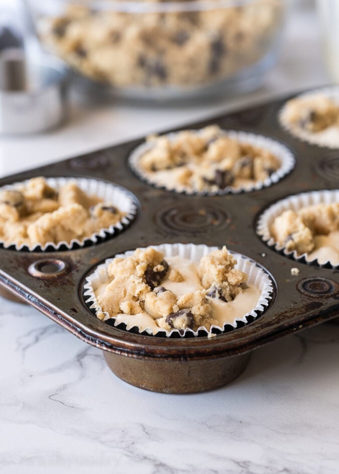 Top each cheesecake filled cup with a few pieces of cookie dough!