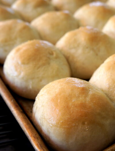 A close up of a pan or baked rolls