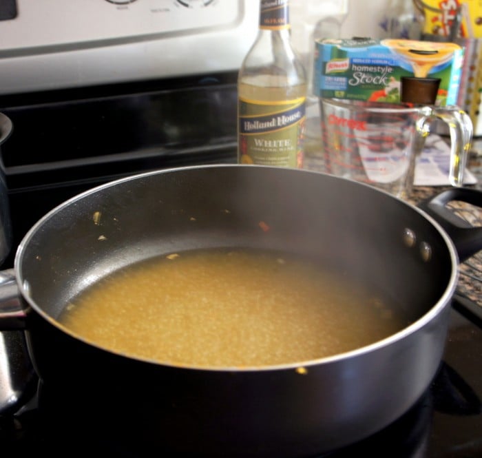 A pan with broth in it