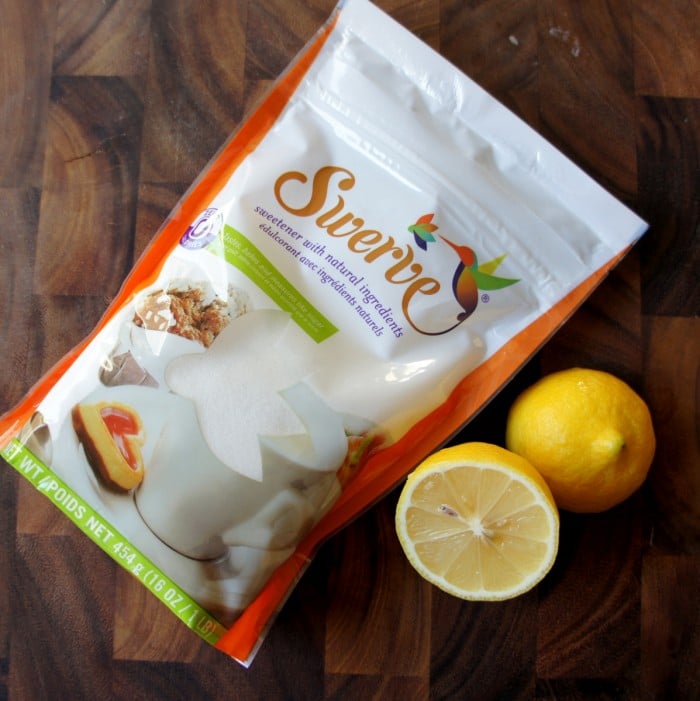 A bag of Swerve with two halves of a lemon next to it