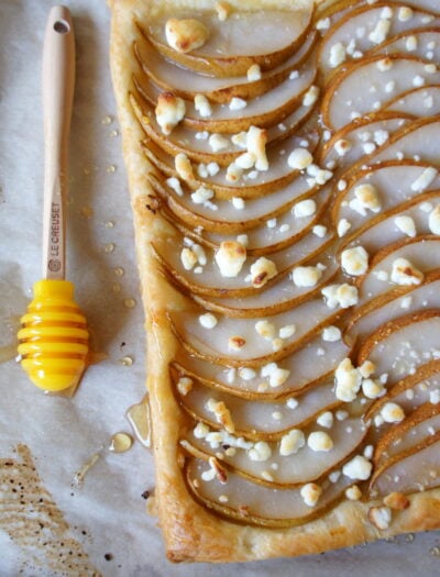 A close up of Pear, Goat Cheese and Honey Tart on a pan