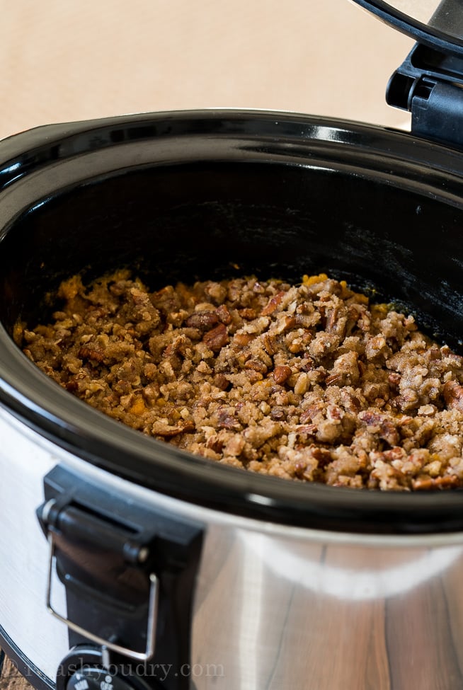 Sprinkle the brown sugar pecan topping over the mashed sweet potatoes and let cook for another 2 hours.