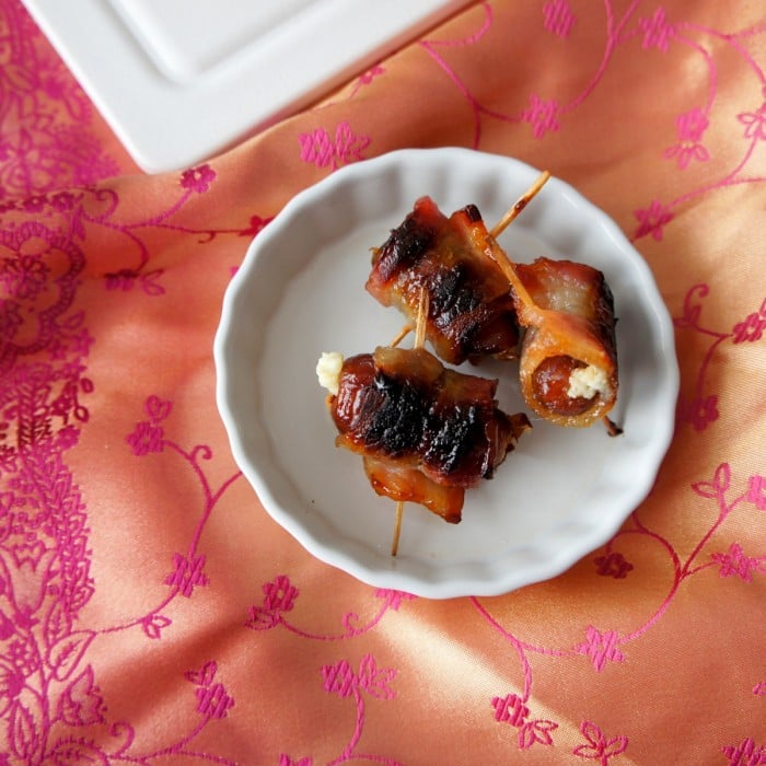 A bowl with bacon wrapped dates