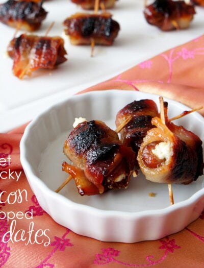 Bacon wrapped mini hot-dogs displayed in a dish.