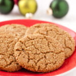 A close up of a plate with ginger cookies on it