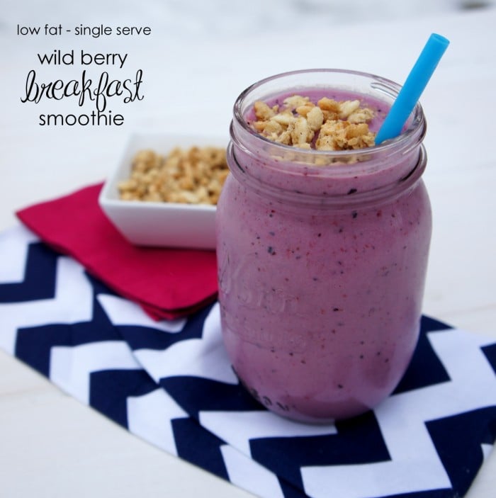 This Wild Berry Breakfast Smoothie features a crunchy granola topping and loads of berries inside!