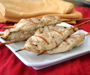 Skewered Chicken tender strips on a plate