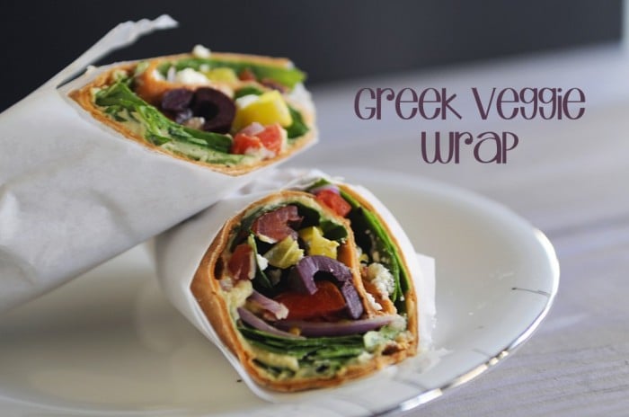 Two halves of a wrap on a plate
