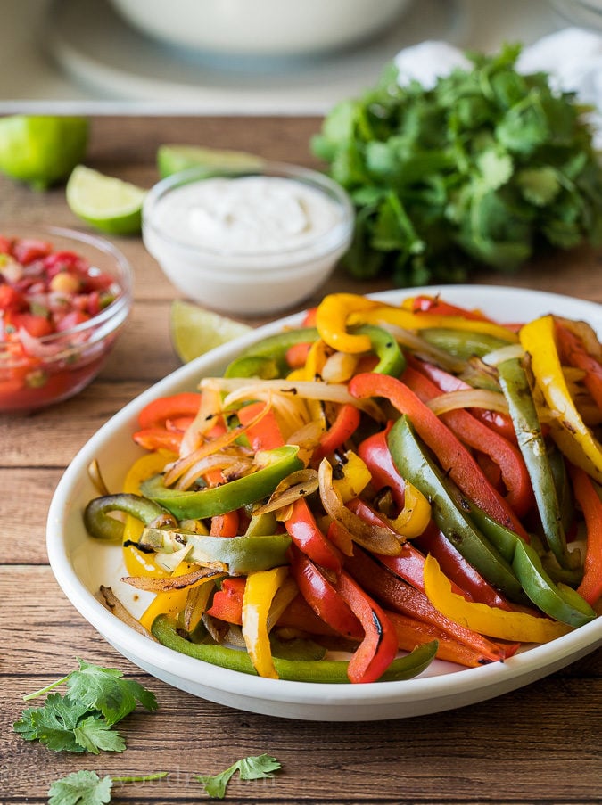 Charred sweet peppers make the best addition to steak fajitas