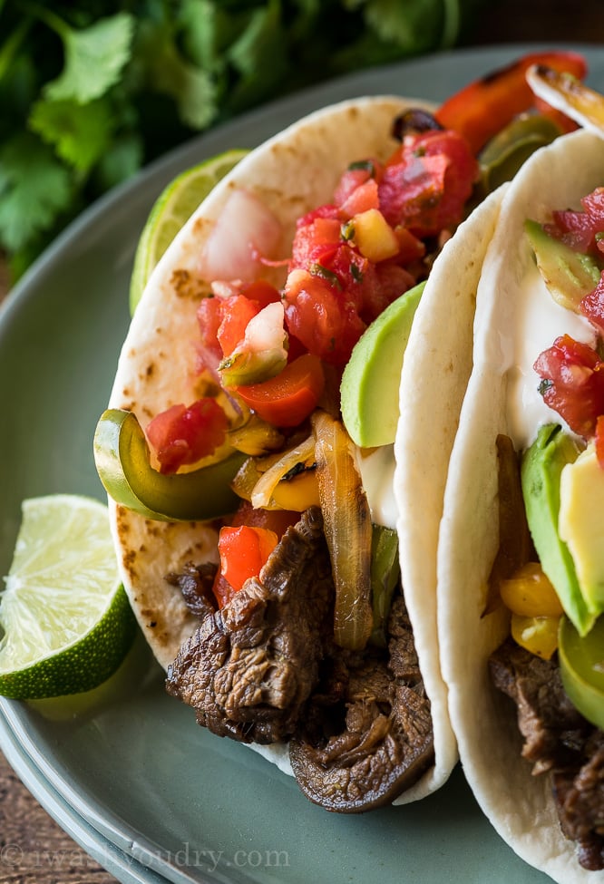 These quick and easy Steak Fajitas are sure to become your new favorite weeknight dinner! YUM!