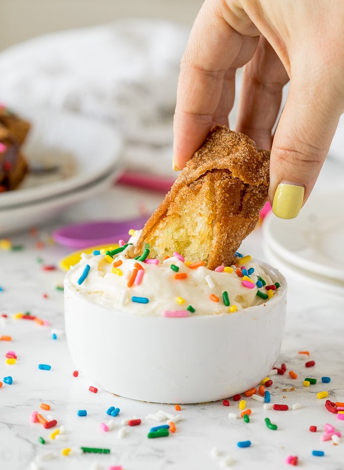 These Birthday Cake Egg Rolls are so fun! They taste like a giant churro that's been stuffed with birthday cake! OH YES!