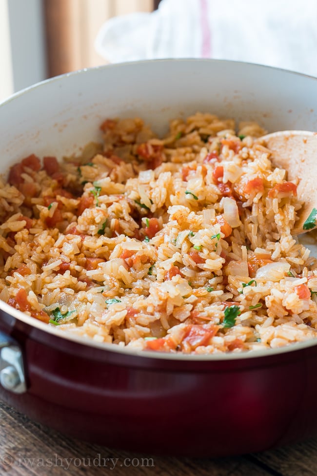 This quick and easy Mexican Rice recipe is always a favorite for taco night or enchilada night!